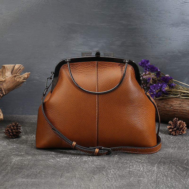 Women's Vintage Totem Embossed Leather Dumpling Bag – Lock Closure Genuine Leather Handbag